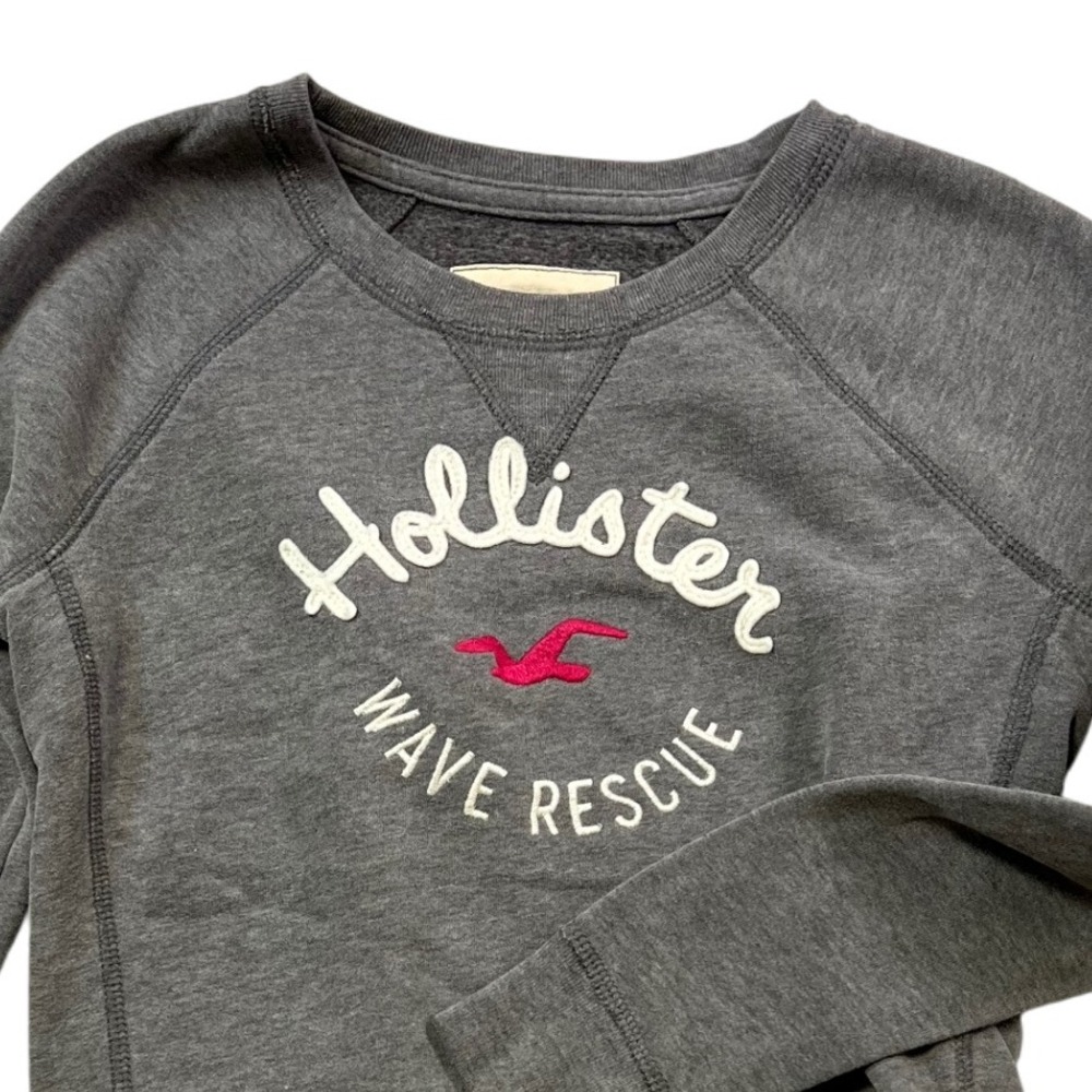Hollister Charcoal Gray Sweatshirt with White Script and Pink Logo